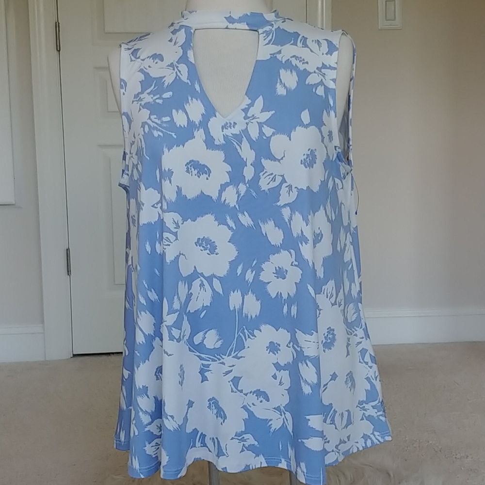 Sleeveless tunic with banded neckline